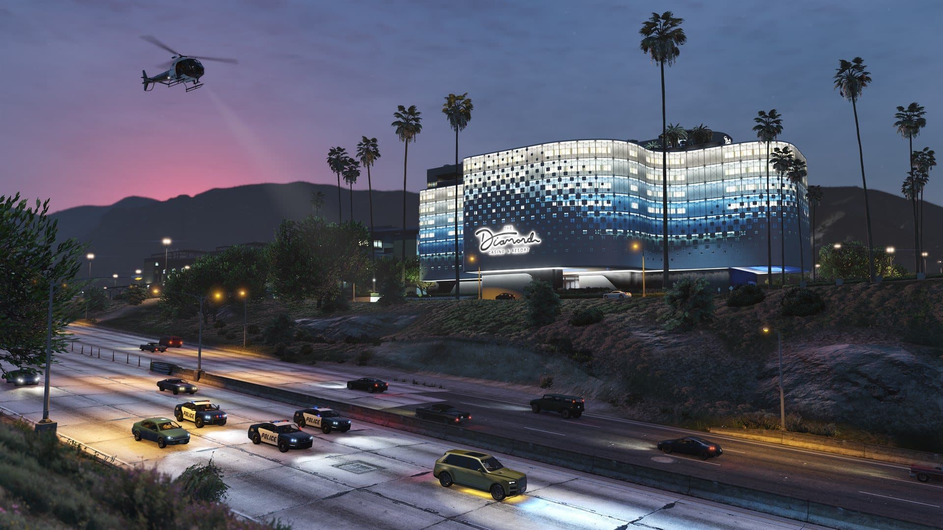 Le Diamond Casino & Resort illuminé au crépuscule, au-dessus de l'autoroute